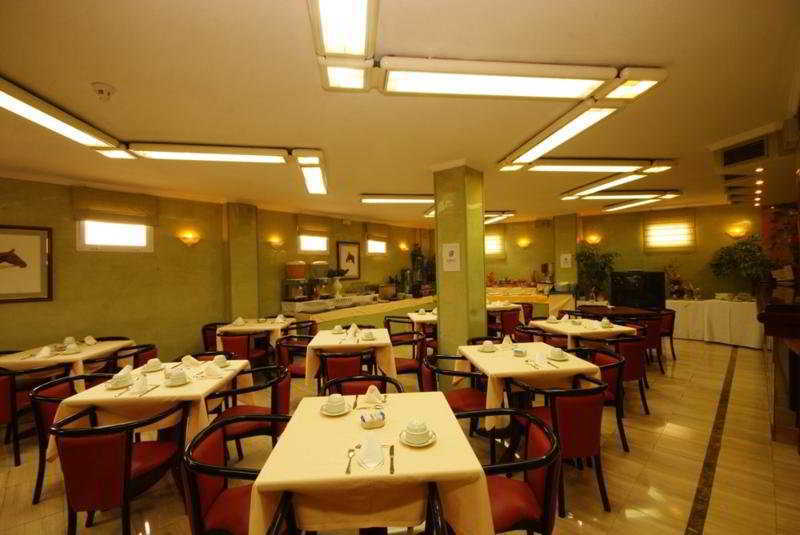 Hotel Derby Sevilla Ресторан фото